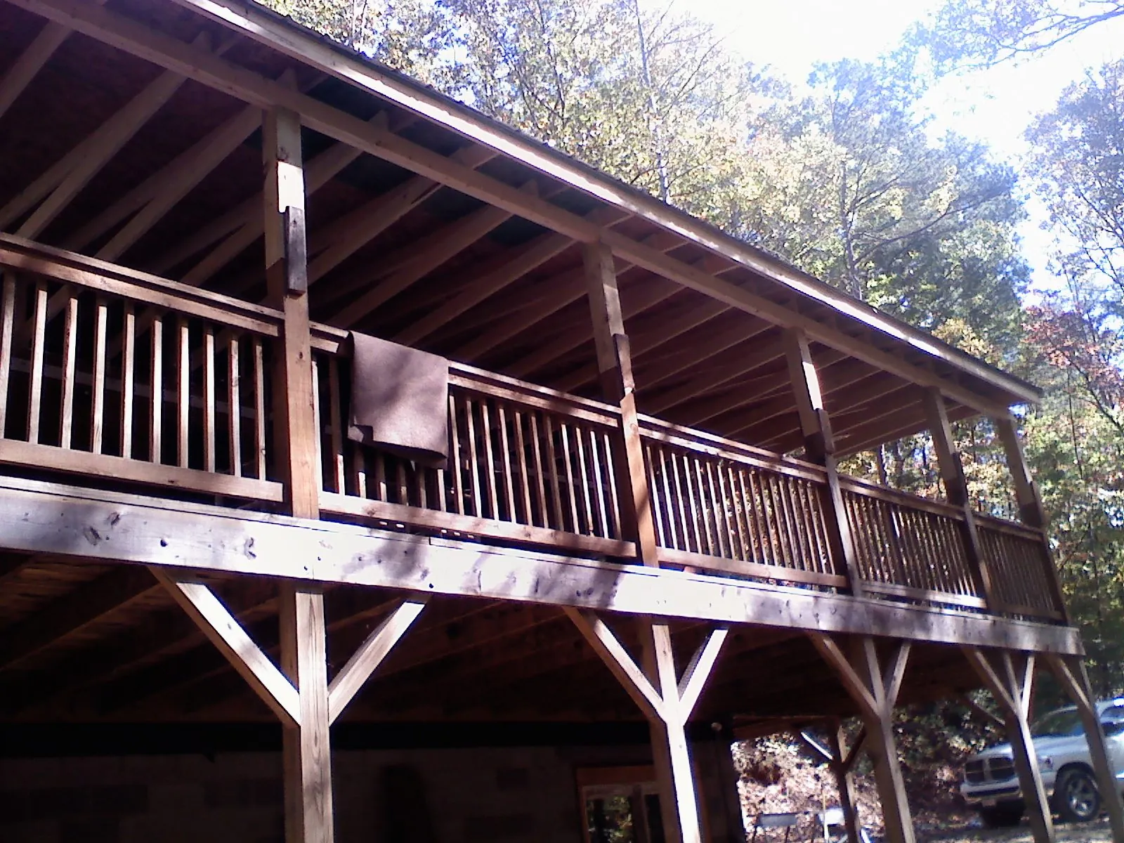 Timber framing under a new elevated porch and deck — Roof Leak Repair in Bluemont by Roofing Brothers